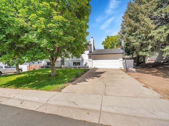 13246 Deneb Dr, Lone Tree, CO 80124 - obstructed view of property with concrete driveway and a garage