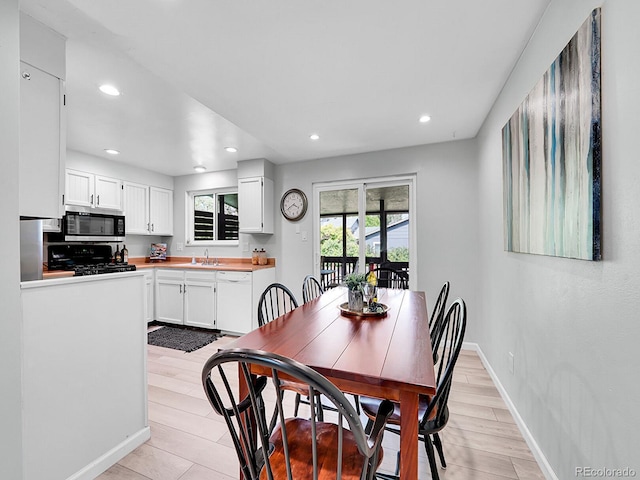 13246 Deneb Dr, Lone Tree, CO 80124 - dining area featuring recessed lighting and light wood-type flooring