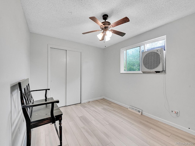 13246 Deneb Dr, Lone Tree, CO 80124 - unfurnished room featuring a textured ceiling, ceiling fan, and light wood-type flooring