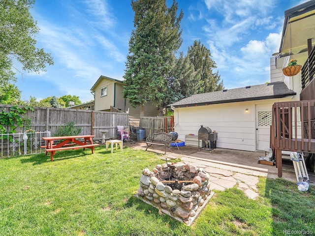 13246 Deneb Dr, Lone Tree, CO 80124 - fenced backyard featuring a fire pit and a patio area
