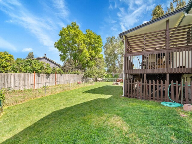 13246 Deneb Dr, Lone Tree, CO 80124 - fenced backyard featuring a deck