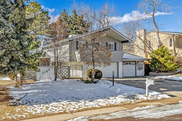 front of property with a garage