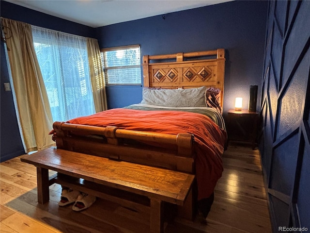 bedroom featuring hardwood / wood-style floors