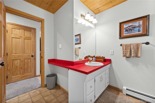 bathroom with tile patterned flooring, vanity, wood ceiling, and a baseboard heating unit