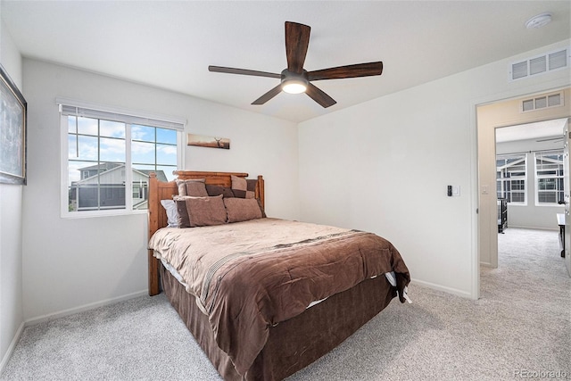3934 N Quatar Ct, Aurora, CO 80019 - bedroom with light colored carpet and a ceiling fan