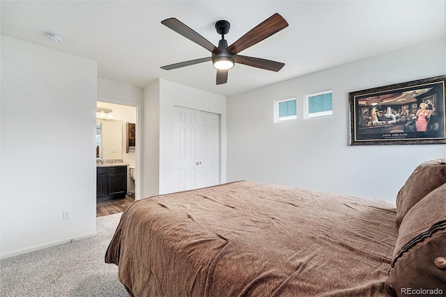 3934 N Quatar Ct, Aurora, CO 80019 - carpeted bedroom featuring ensuite bath, a ceiling fan, and a closet