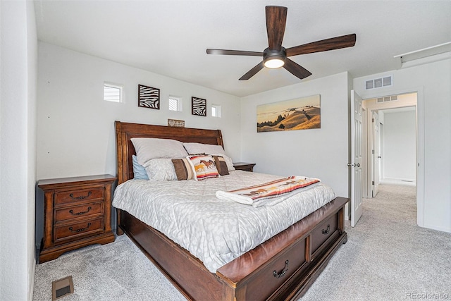 3934 N Quatar Ct, Aurora, CO 80019 - bedroom featuring light colored carpet and a ceiling fan
