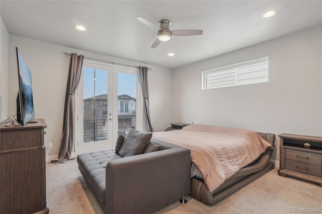 bedroom featuring access to outside, light carpet, and ceiling fan