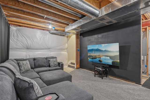 cinema room with light colored carpet