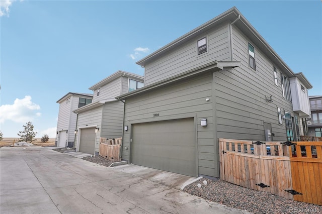 view of property exterior featuring a garage