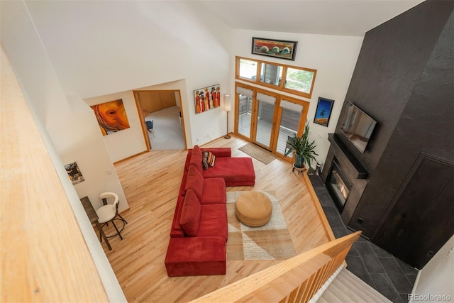 23624 Pondview Pl Unit G, Golden, CO 80401 - living room featuring wood finished floors and a towering ceiling