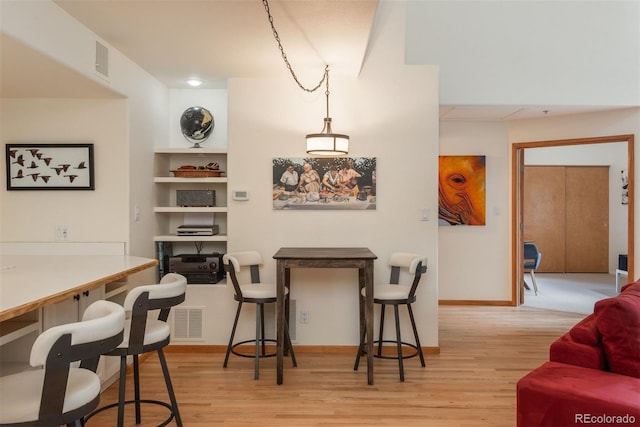 23624 Pondview Pl Unit G, Golden, CO 80401 - dining room with wood finished floors and built in features