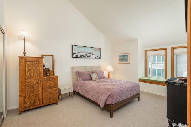 23624 Pondview Pl Unit G, Golden, CO 80401 - bedroom featuring light carpet and lofted ceiling