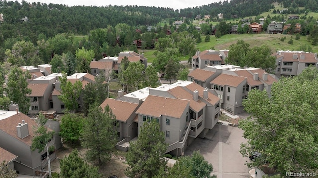 23624 Pondview Pl Unit G, Golden, CO 80401 - aerial perspective of suburban area with a heavily wooded area