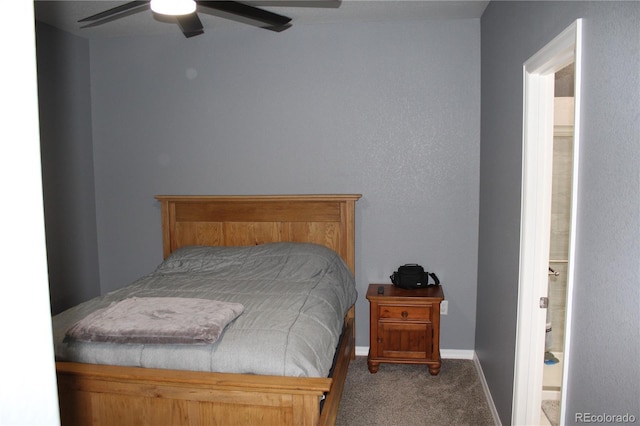carpeted bedroom with a ceiling fan and baseboards