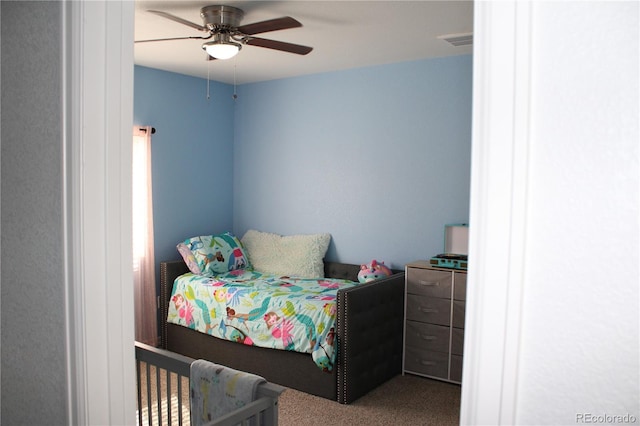 bedroom featuring carpet flooring and a ceiling fan