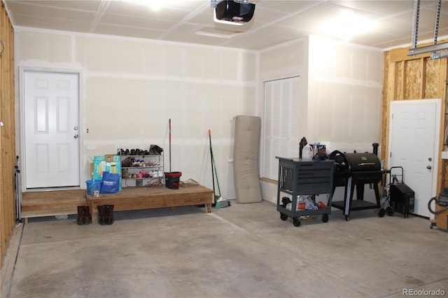 garage featuring a garage door opener