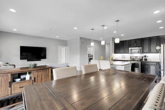 19210 E Pacific Pl, Aurora, CO 80013 - dining space with recessed lighting