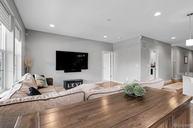 19210 E Pacific Pl, Aurora, CO 80013 - living room featuring recessed lighting and light wood finished floors