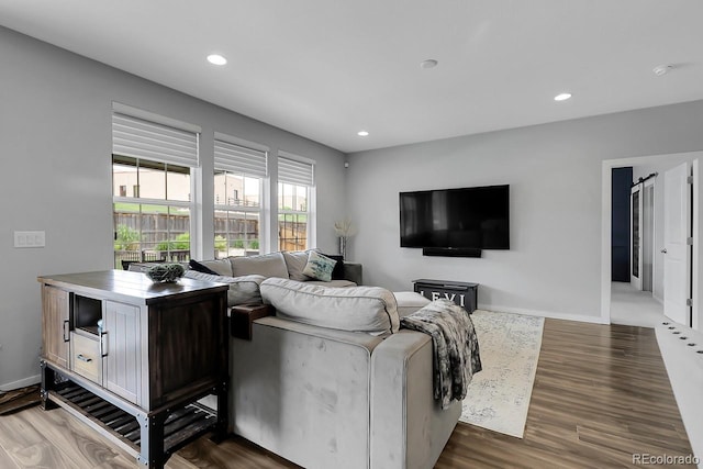 19210 E Pacific Pl, Aurora, CO 80013 - living area featuring wood finished floors and recessed lighting