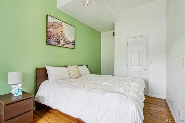 915 26th St, Denver, CO 80205 - bedroom featuring wood finished floors and baseboards