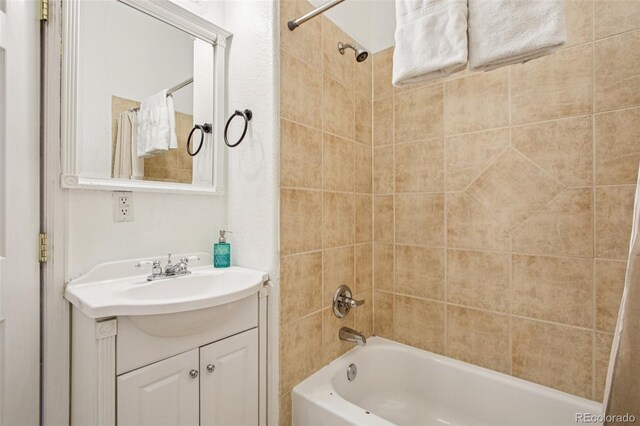 915 26th St, Denver, CO 80205 - bathroom with vanity and shower / bath combo with shower curtain