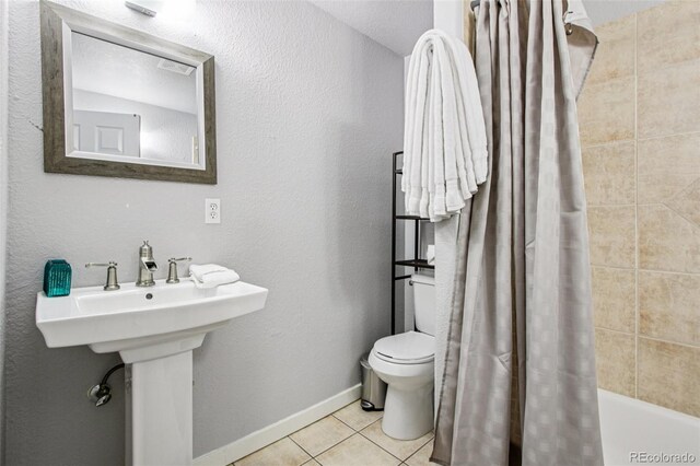 915 26th St, Denver, CO 80205 - bathroom featuring tile patterned flooring and shower / bath combo