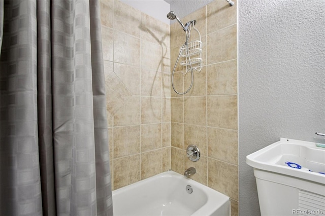 915 26th St, Denver, CO 80205 - bathroom with shower / bath combo with shower curtain and a textured wall
