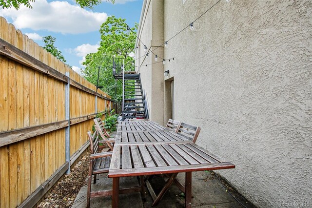 915 26th St, Denver, CO 80205 - view of patio / terrace with stairs and outdoor dining space