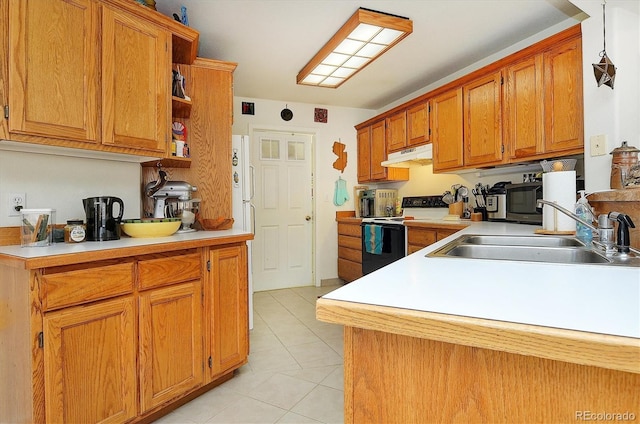 kitchen featuring electric range oven, open shelves, a sink, light countertops, and under cabinet range hood