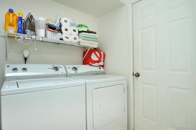 laundry room featuring laundry area and washing machine and dryer