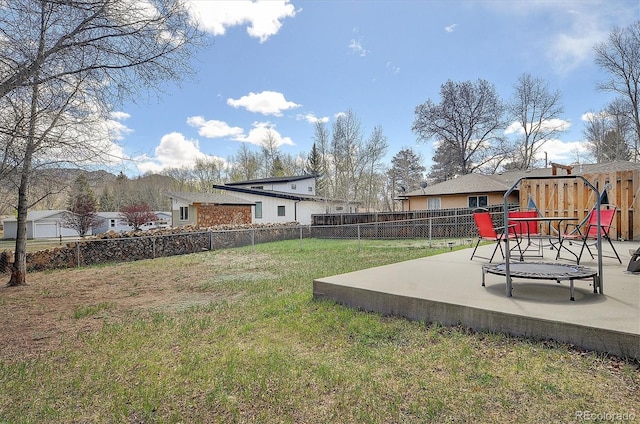 view of yard featuring a fenced backyard and a patio area