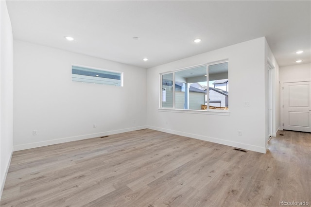 5271 Rendezvous Pkwy, Timnath, CO 80547 - unfurnished room with light wood finished floors, plenty of natural light, baseboards, and recessed lighting