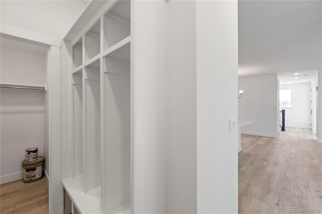 5271 Rendezvous Pkwy, Timnath, CO 80547 - mudroom featuring light wood-type flooring and baseboards