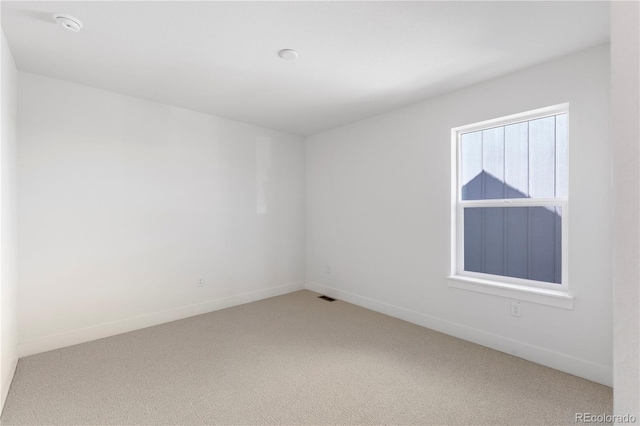 5271 Rendezvous Pkwy, Timnath, CO 80547 - spare room with carpet flooring, baseboards, and a smoke detector