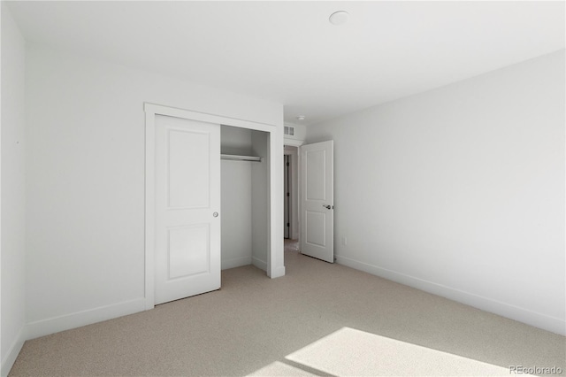 5271 Rendezvous Pkwy, Timnath, CO 80547 - unfurnished bedroom featuring carpet, a closet, and baseboards