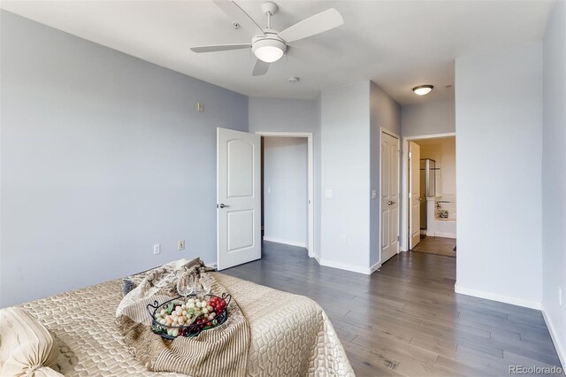 13456 Via Varra Unit 315, Broomfield, CO 80020 - bedroom with wood finished floors, baseboards, and ceiling fan