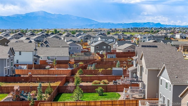 birds eye view of property featuring a mountain view