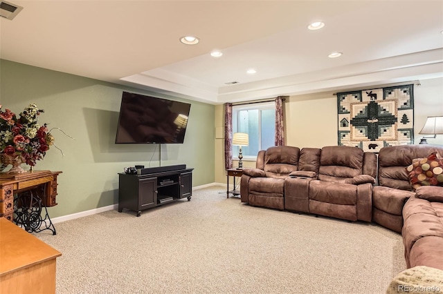 living area featuring light carpet, recessed lighting, and baseboards