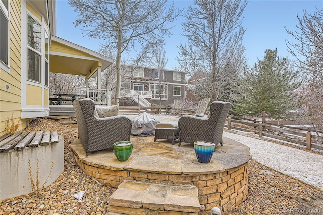view of patio / terrace featuring fence