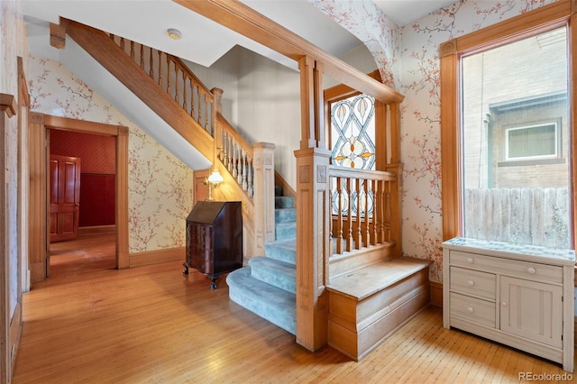 staircase featuring hardwood / wood-style flooring