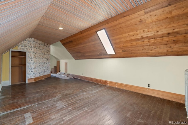 bonus room featuring lofted ceiling, wooden ceiling, and dark hardwood / wood-style floors