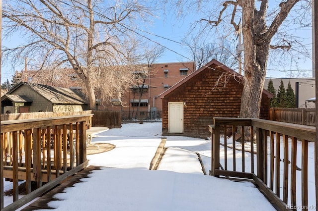 view of snow covered deck