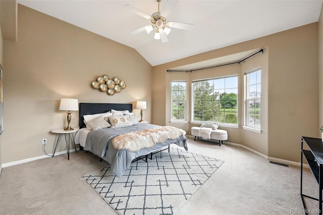 3240 W 114th Cir Unit D, Westminster, CO 80031 - carpeted bedroom featuring baseboards, vaulted ceiling, and a ceiling fan