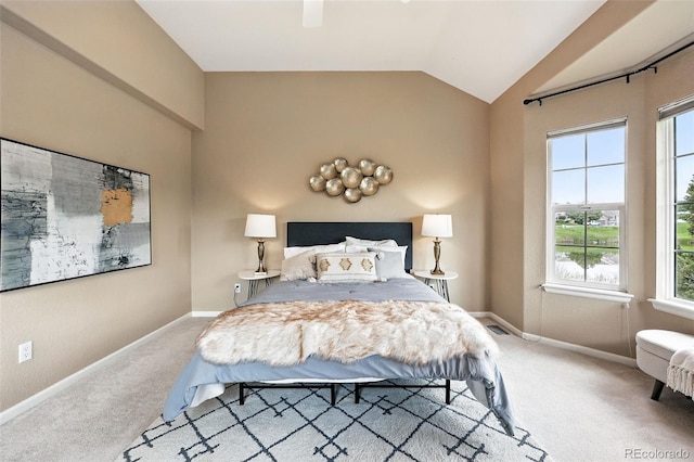 3240 W 114th Cir Unit D, Westminster, CO 80031 - bedroom with carpet, multiple windows, vaulted ceiling, and baseboards