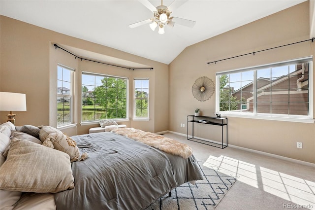 3240 W 114th Cir Unit D, Westminster, CO 80031 - bedroom featuring multiple windows, carpet flooring, baseboards, and vaulted ceiling