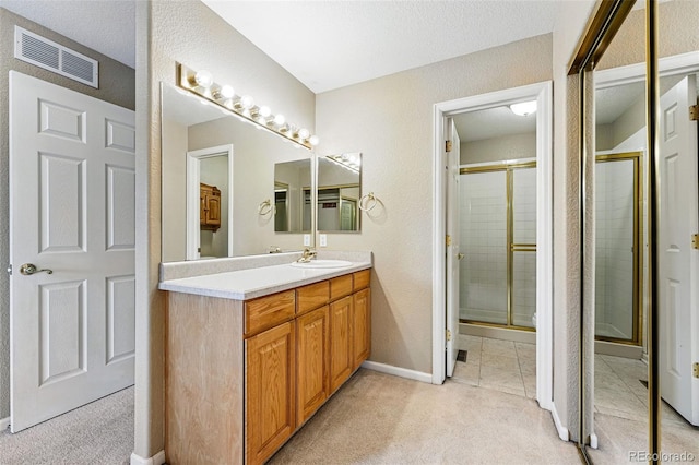 3240 W 114th Cir Unit D, Westminster, CO 80031 - full bath featuring vanity, a shower stall, and baseboards