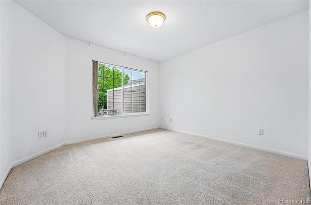 3240 W 114th Cir Unit D, Westminster, CO 80031 - carpeted spare room with baseboards