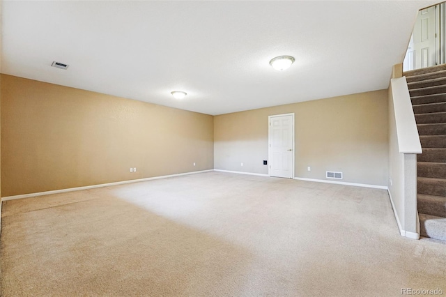 3240 W 114th Cir Unit D, Westminster, CO 80031 - empty room featuring stairway, baseboards, and light carpet