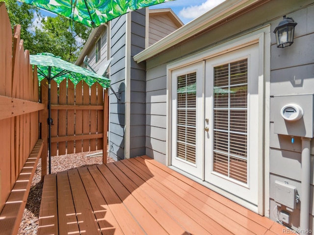 wooden deck featuring french doors